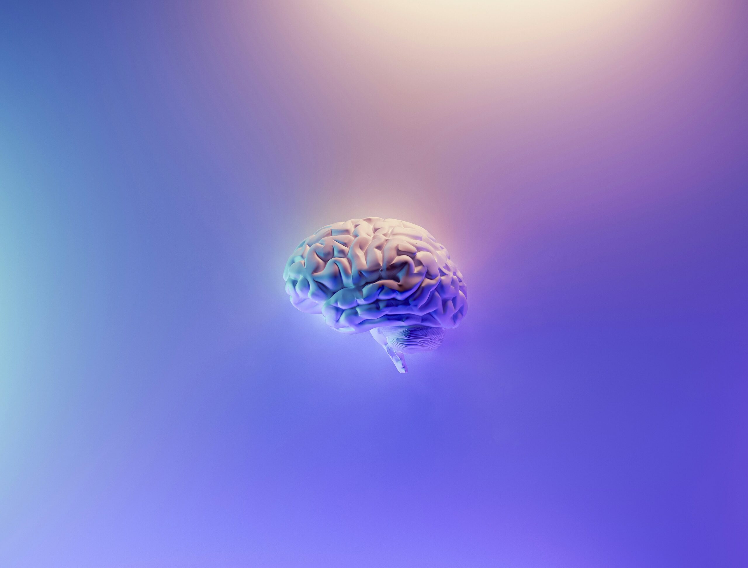 3d rendering of a brain in iridescent pastel colors