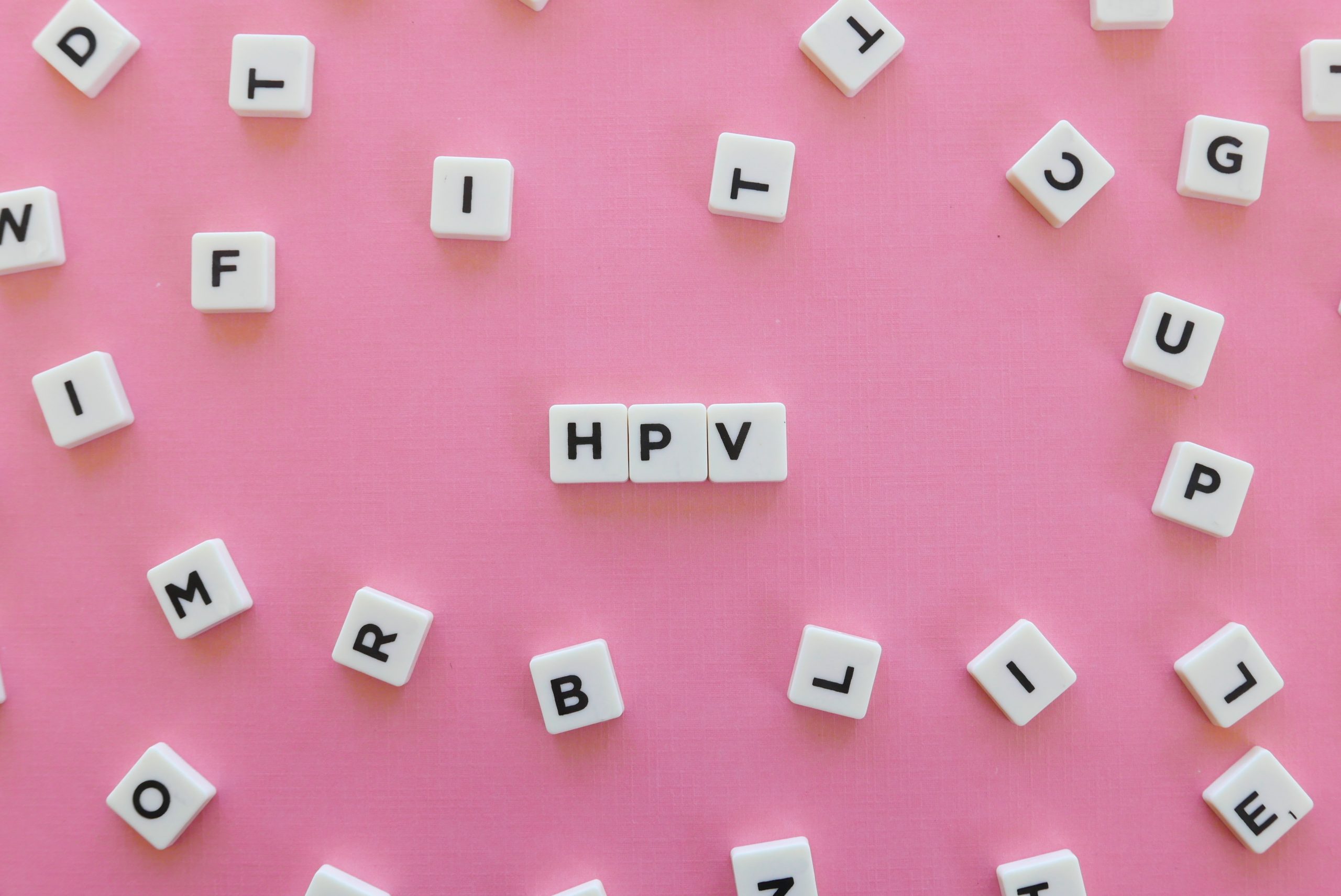 HPV (Human Papillomavirus) acronym word made of square letter wo Image of computer screen, logged into WordPress, with backend screen to create a new post.