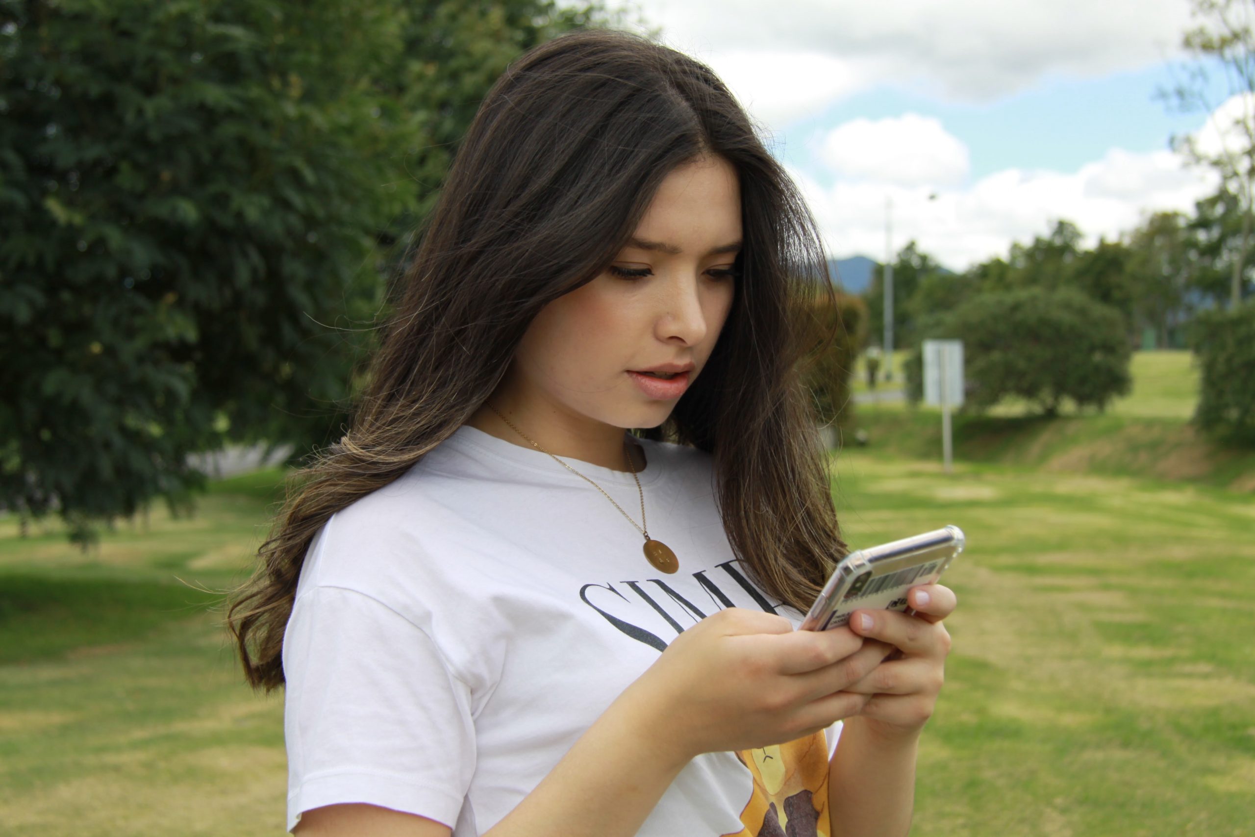young woman checking her phone
